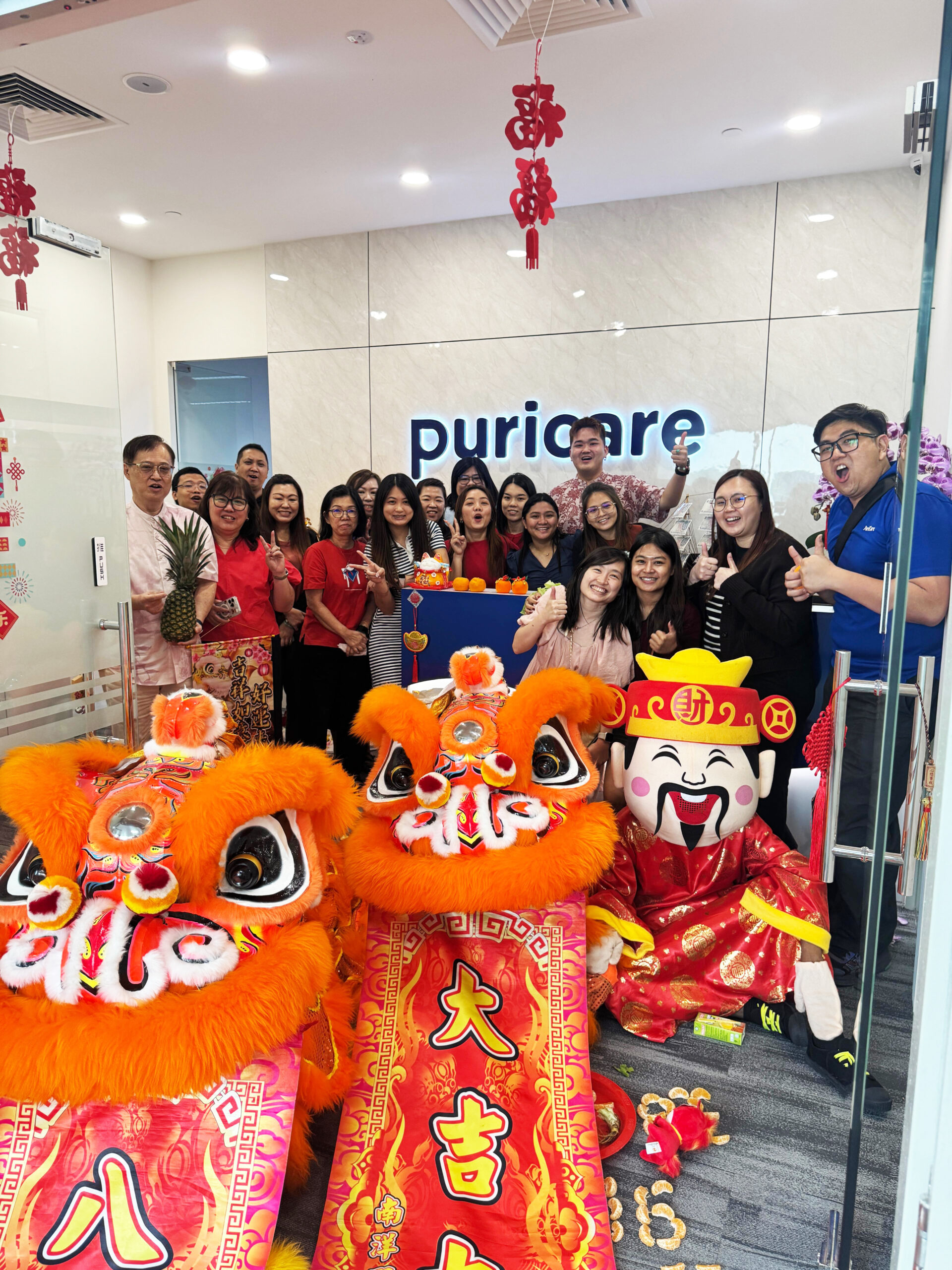Welcoming Prosperity: Chinese New Year Lion Dance in the Office